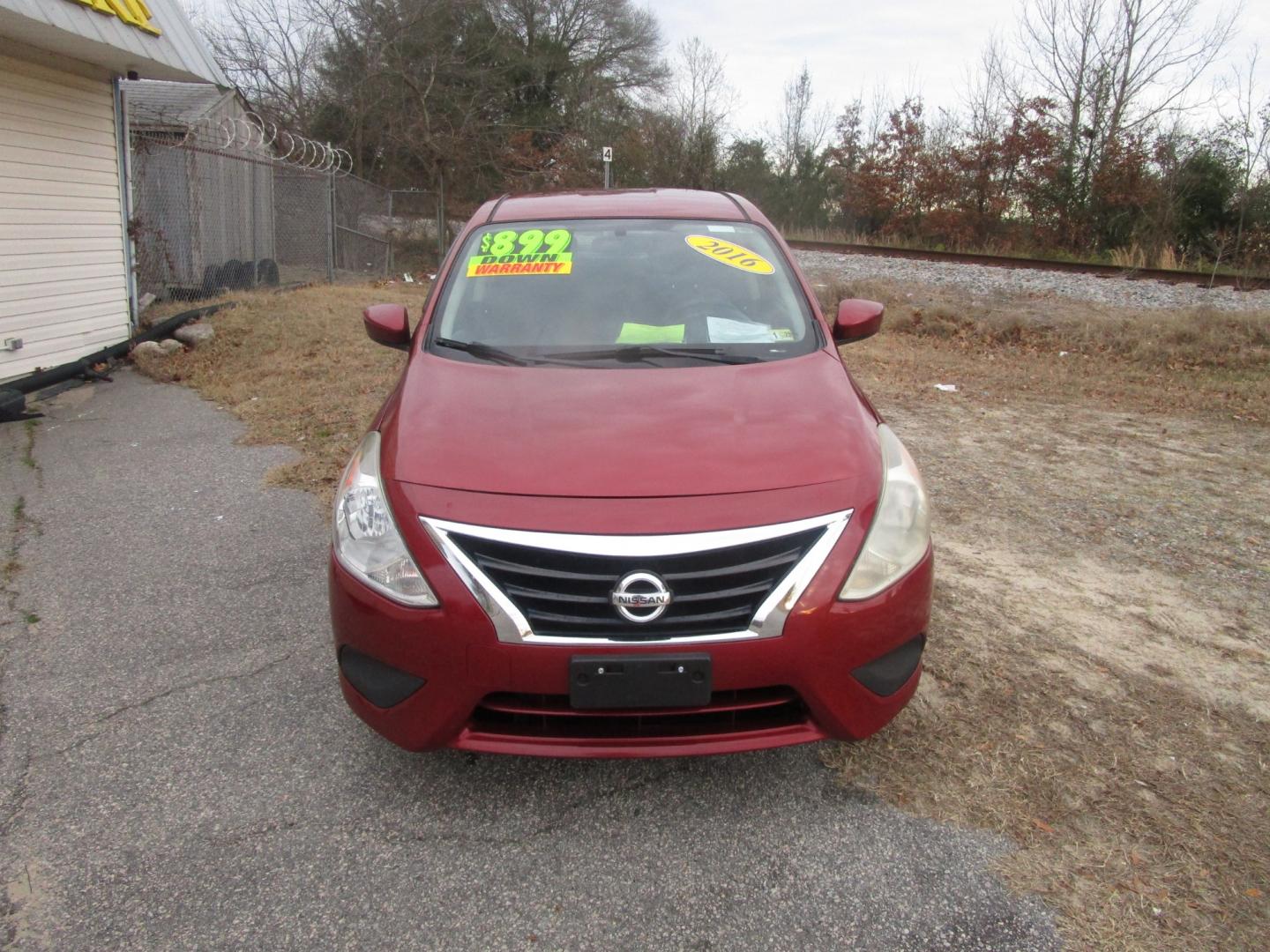 2016 Red Nissan Versa 1.6 S 5M (3N1CN7AP7GL) with an 1.6L L4 DOHC 16V engine, 5M transmission, located at 2553 Airline Blvd, Portsmouth, VA, 23701, (757) 488-8331, 36.813889, -76.357597 - Photo#2